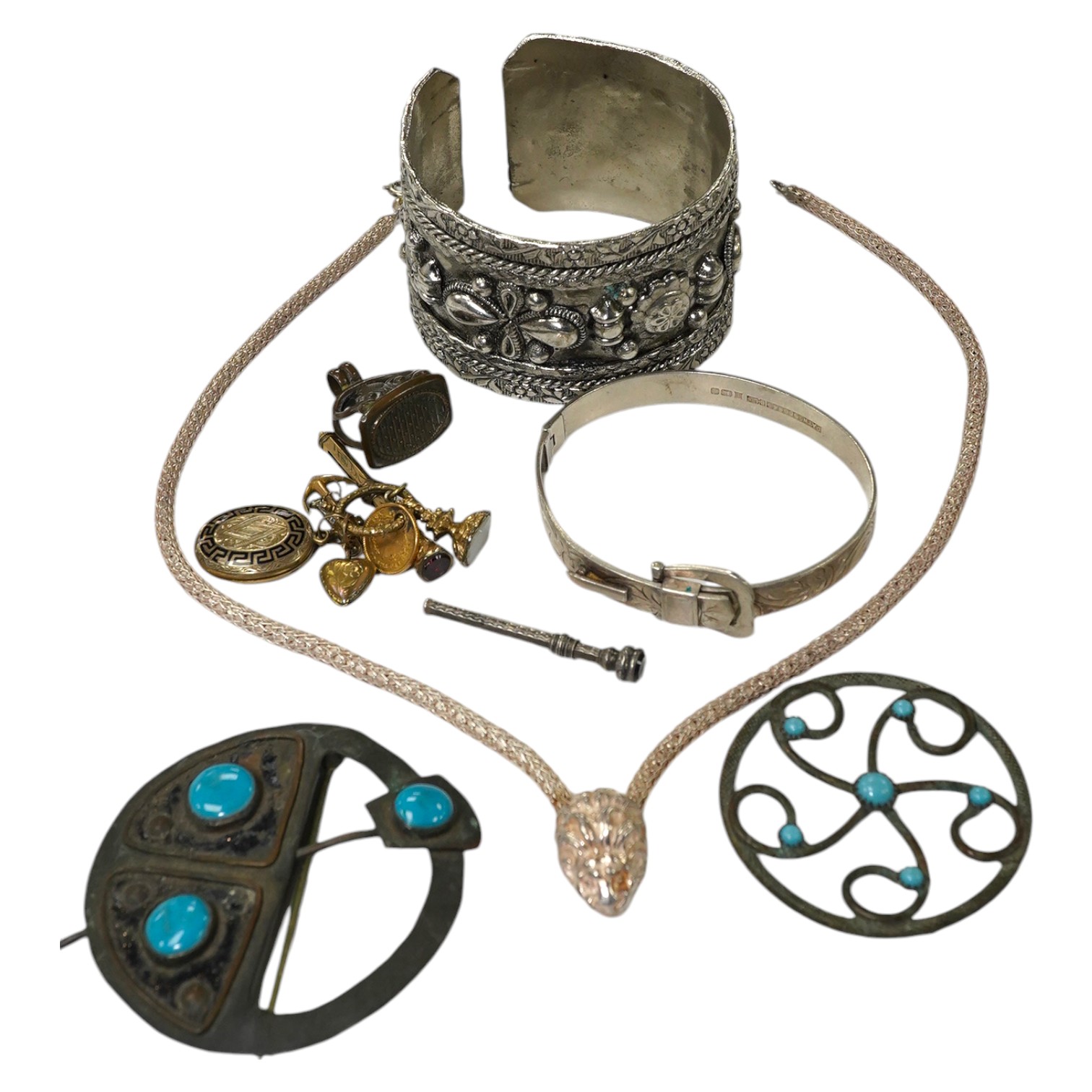 A small quantity of assorted costume jewellery including a fob seal and a one dollar gold charm. Condition - fair to good